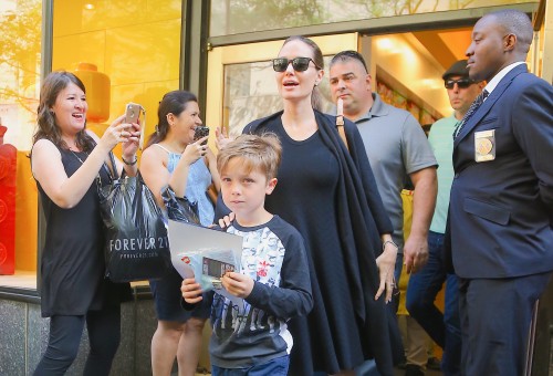Angelina Jolie & Her Son Knox Shop At The Lego Store In NYC