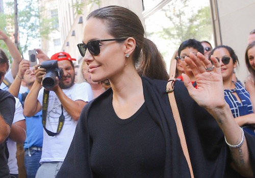 Angelina Jolie & Her Son Knox Shop At The Lego Store In NYC